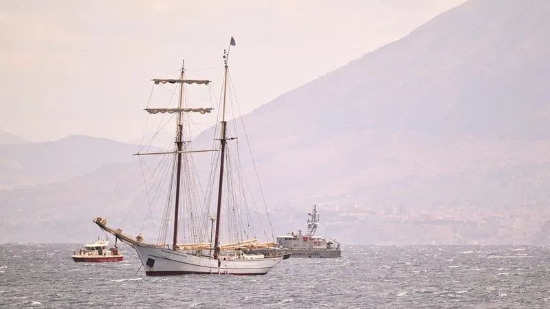 One dead, six missing after luxury yacht sinks off Sicily